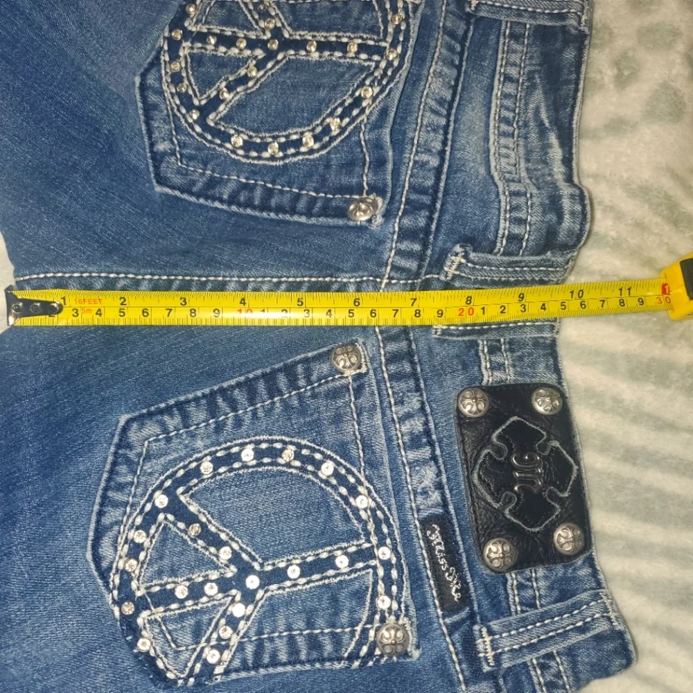 Miss Me Bermuda jean shorts with rhinestones peace sign on back pockets …